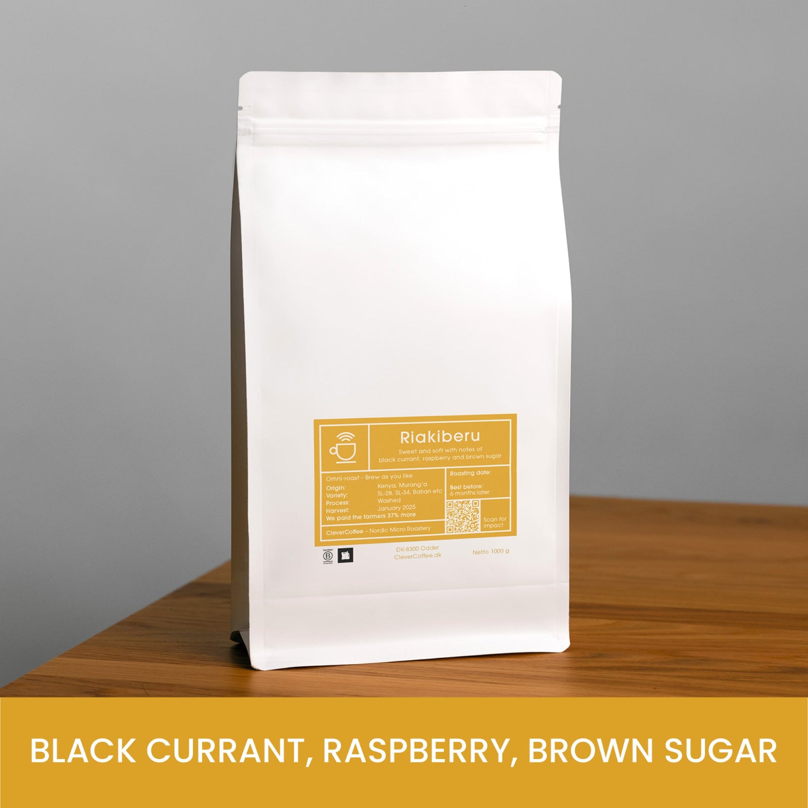 Riakiberu kaffepose, med tekst "Black Currant, Raspberry, Brown Sugar".