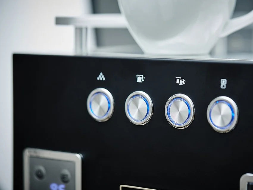 Detaljebillede af knapper på Bellezza Bellona espressomaskine.