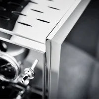 Detaljebillede af espressomaskine.